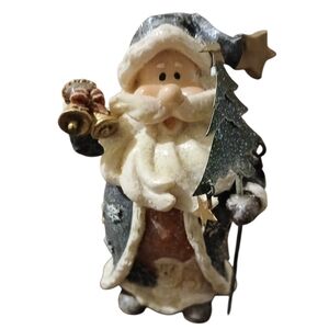 Festive Santa Claus Figurine with Tree, Bell, and Stars